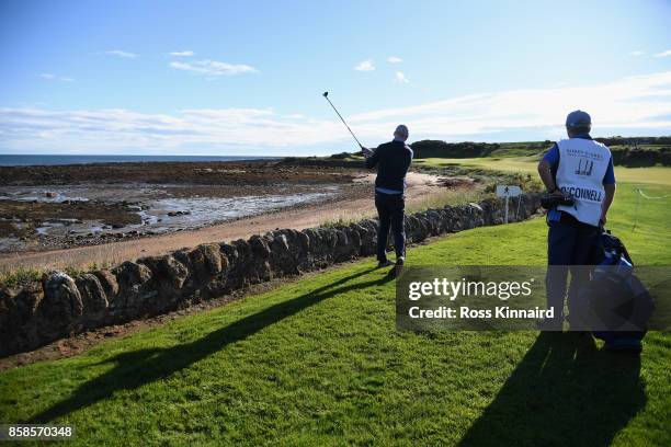 Paul O'Connell, former rugby player plays his third shot on the 12th during day three of the 2017 Alfred Dunhill Championship at Kingsbarns on...