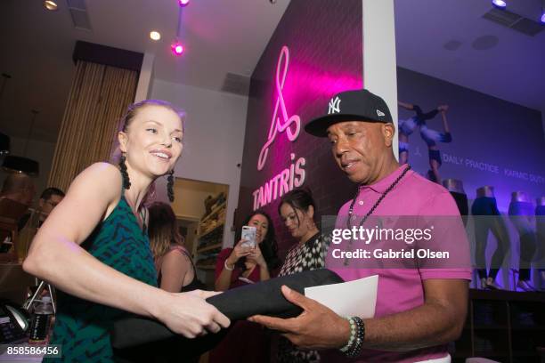 Izabella Miko and Russell Simmons attend his 60th Birthday Party at his Tantris Yoga Center on October 6, 2017 in West Hollywood, California.