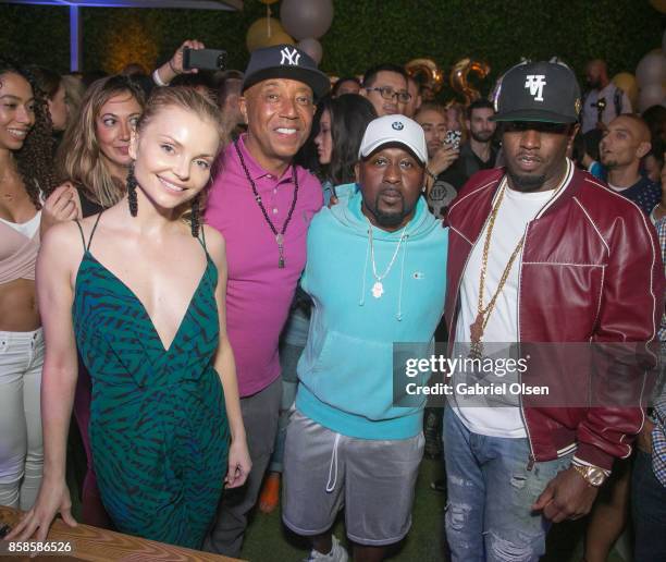 Izabella Miko, Russell Simmons, O'Neal McKnight and Sean Diddy Combs attend Russell Simmons' 60th Birthday Party at his Tantris Yoga Center on...