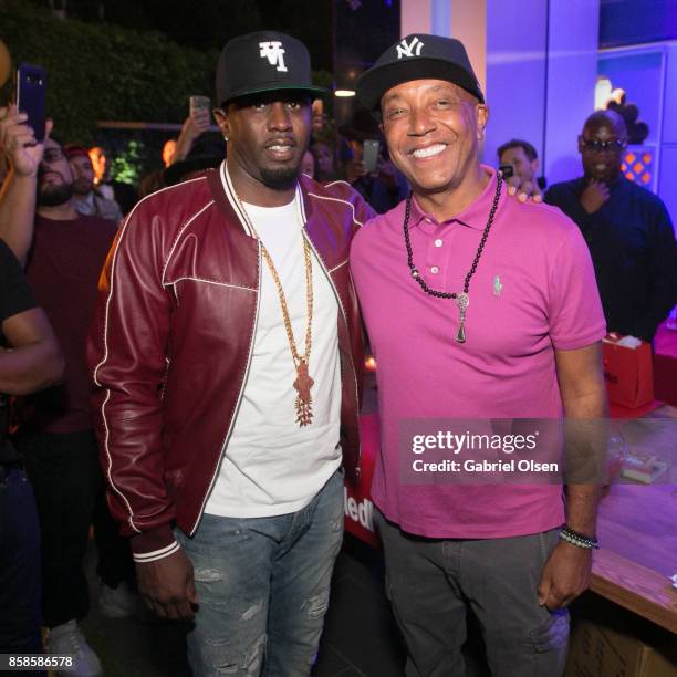 Russell Simmons and Sean Diddy Combs attend Russell Simmons' 60th Birthday Party at his Tantris Yoga Center on October 6, 2017 in West Hollywood,...