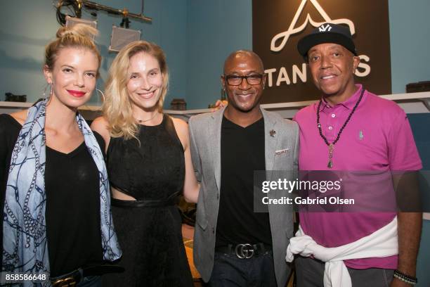 Tommy Davidson and Russell Simmons attend Russell Simmons 60th Birthday Party at his Tantris Yoga Center on October 6, 2017 in West Hollywood,...