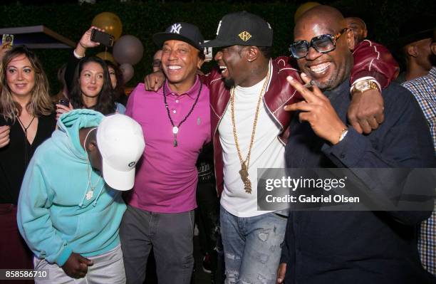 Neal McKnight, Russell Simmons, Sean Diddy Combs and guest attend Russell Simmons' 60th Birthday Party at his Tantris Yoga Center on October 6, 2017...