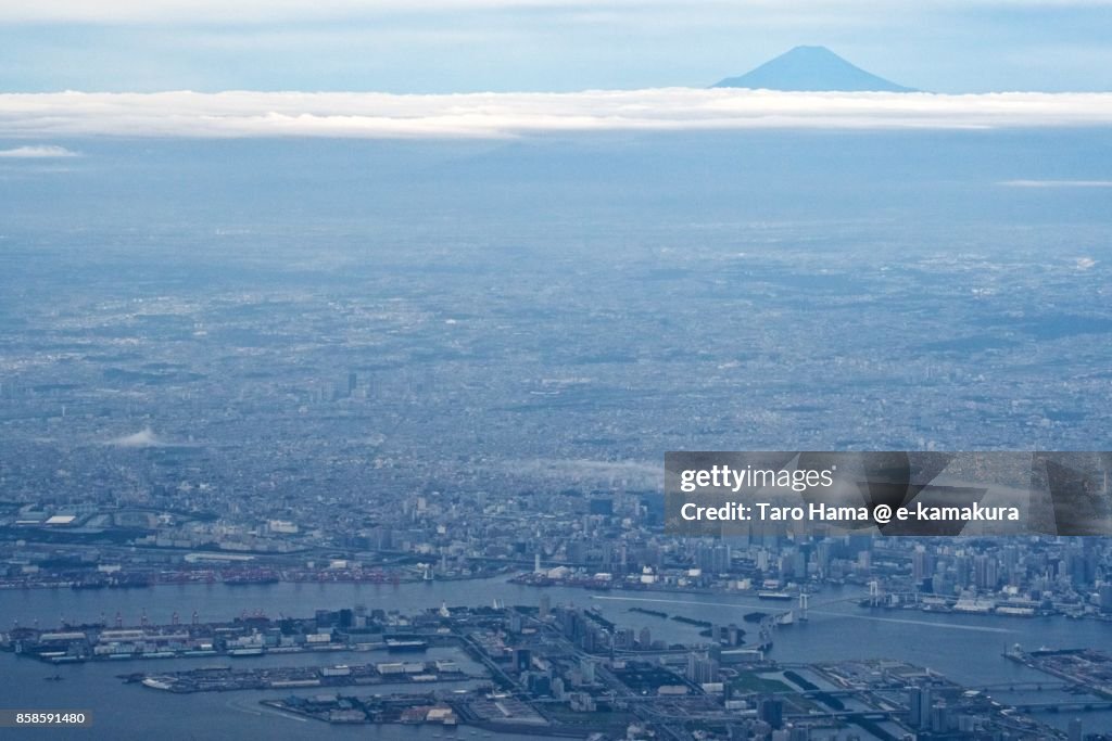 Mt. Fuji and Tokyo city in Japan daytime aerial view from airplane