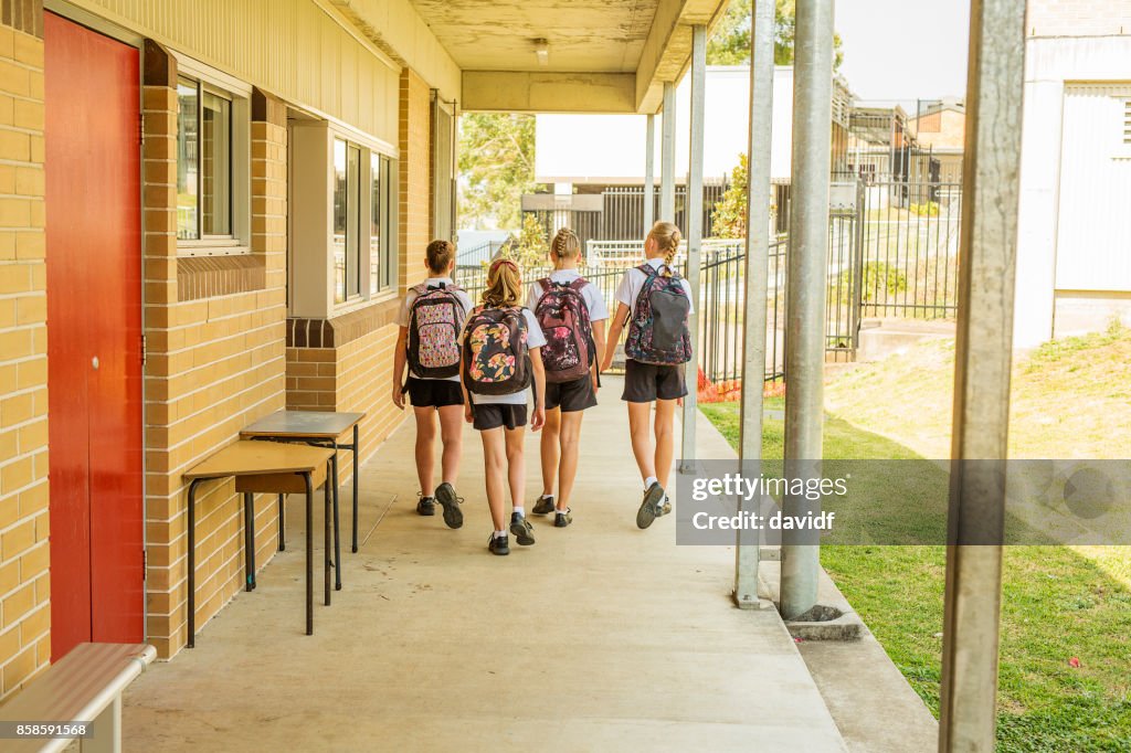 Girl Junior High School Students Arriving at School