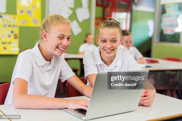 education of junior high school girl students using computers - high school students stock pictures, royalty-free photos & images