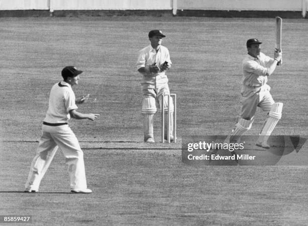 English cricketer Jim Laker during his innings of 43 for Surrey against Australia at The Oval, London, 17th May 1956.