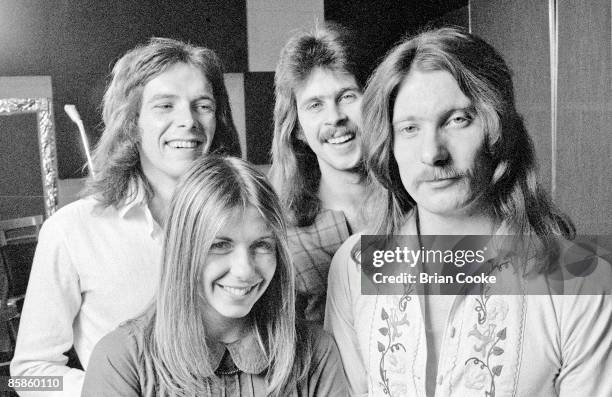 Annie Haslam, Terry Sullivan, Jon Camp, John Tout of Renaissance posed at De Lane Lea Music, Wembley, North London on June 29 1973