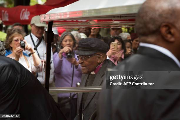 Archbishop Emeritus and Nobel Prize Laurate, Desmond Tutu, arrives for the unveiling of the 'Arch for the Arch', as part of his 86th birthday...