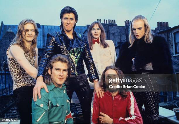 Paul Thompson, Bryan Ferry, Rik Kenton, Brian Eno, Andy Mackay, Phil Manzanera, Roxy Music posed group shot from studio photo shoot in West London on...