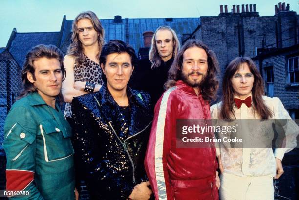Andy Mackay, Paul Thompson, Bryan Ferry, Brian Eno, Phil Manzanera, Rik Kenton, Roxy Music posed group shot from studio photo shoot on September 18...