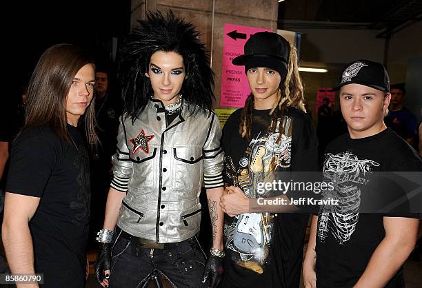 Musicians George Listin, Bill Kaulitz, Tom Kaulitz, and Gustav Schaefer of the band Tokio Hotel pose backstage at the 7th Annual "Los Premios MTV...