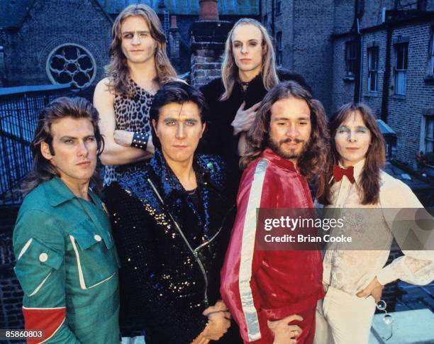 Andy Mackay, Paul Thompson, Bryan Ferry, Brian Eno, Phil Manzanera, Rik Kenton, Roxy Music posed group shot from studio photo shoot in West London on...