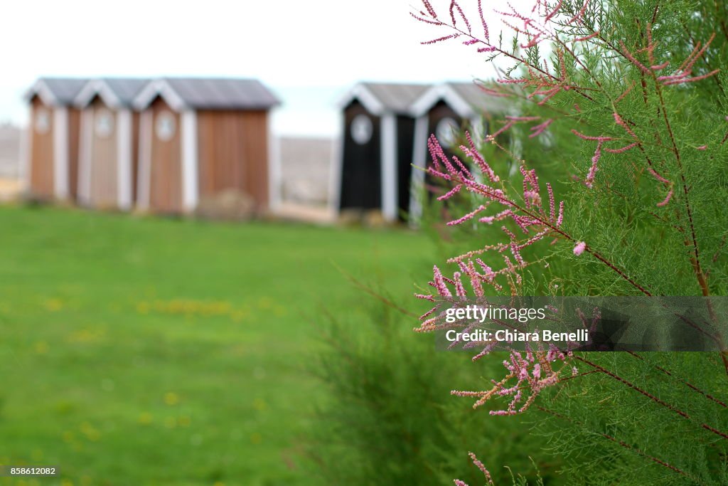 Cabins in front of the Atlantic Ocean