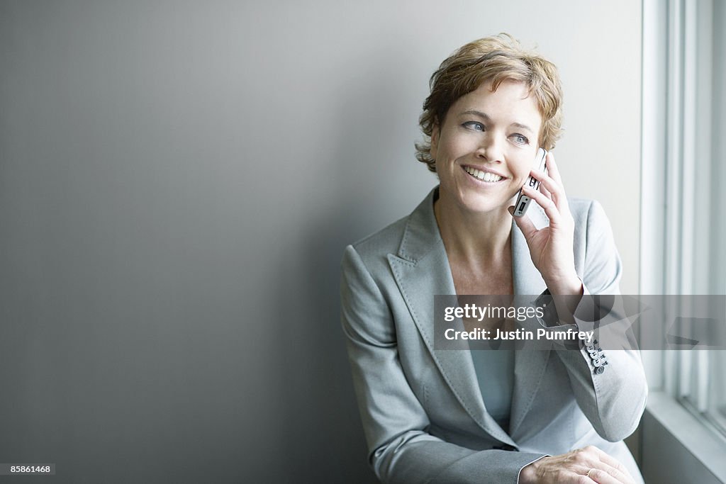 Businesswoman using mobile phone