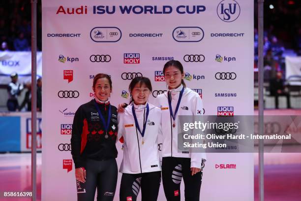 Valerie Maltais of Canada with the silver medal, Jeong Min Choiu of Korea with the gold medal and Hee Suk Shim of Korea with the bronze medal...