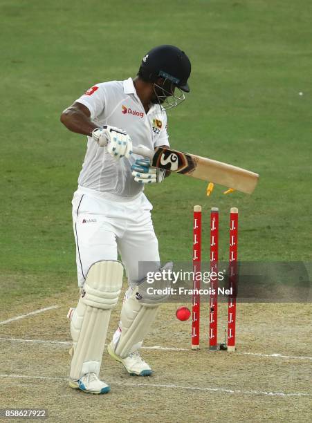 Dimuth Karunaratne of Sri Lanka is bowled by Wahab Riaz of Pakistan during Day Two of the Second Test between Pakistan and Sri Lanka at Dubai...