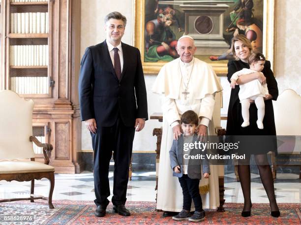 Pope Francis meets Croatia's Prime Minister Andrej Plenkovic and his family during an audience at the Apostolic Palace on October 7, 2017 in Vatican...