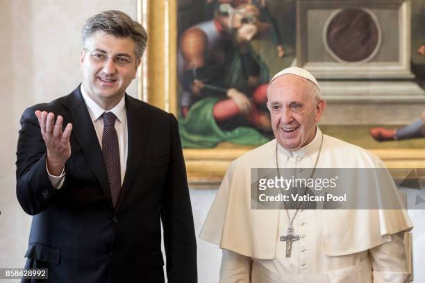 Pope Francis meets Croatia's Prime Minister Andrej Plenkovic during an audience at the Apostolic Palace on October 7, 2017 in Vatican City, Vatican....