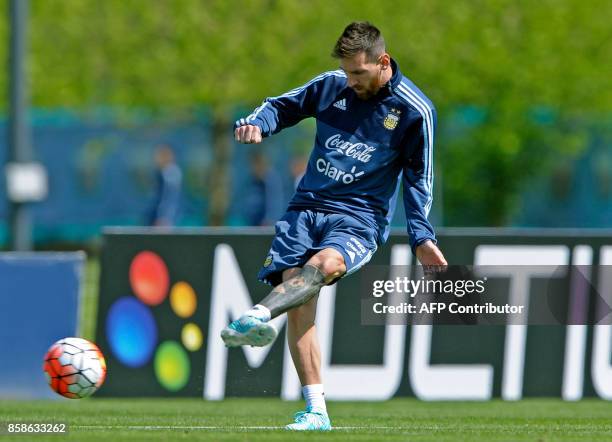 Argentina's forward Lionel Messi kicks the ball during a training session in Ezeiza, Buenos Aires on October 7, 2017 ahead of a 2018 FIFA World Cup...