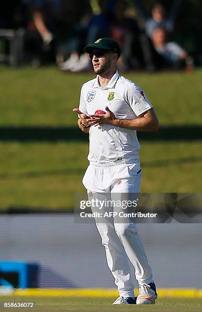 South Africa's fielder Wayne Parnell reacts after taking a catch to dismiss Bangladesh batsman Sabbir Rahman during the second day of the second Test...