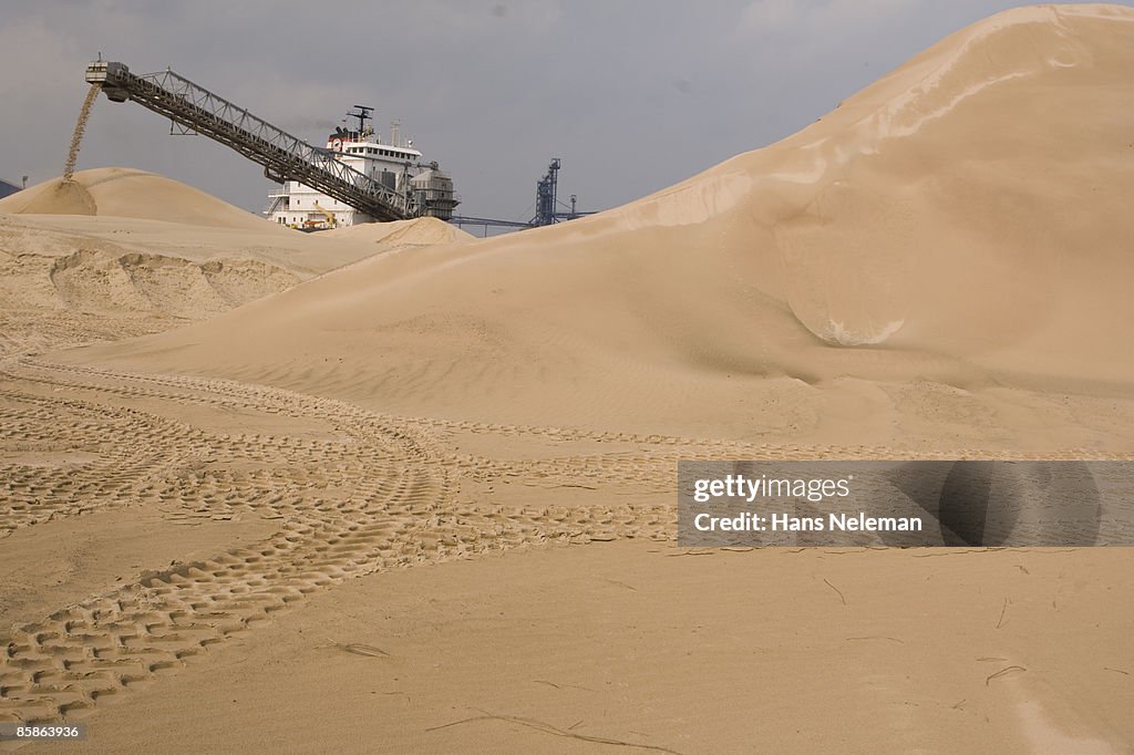 A ship unloading sand at Hamilton, Ontario