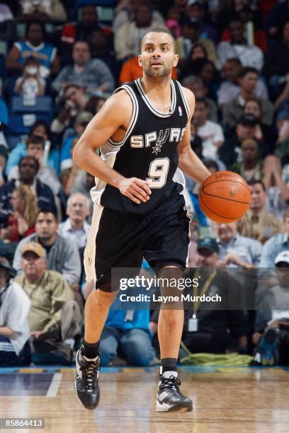 Tony Parker of the San Antonio Spurs brings the ball upcourt against the New Orleans Hornets during the game on March 29, 2009 at the New Orleans...