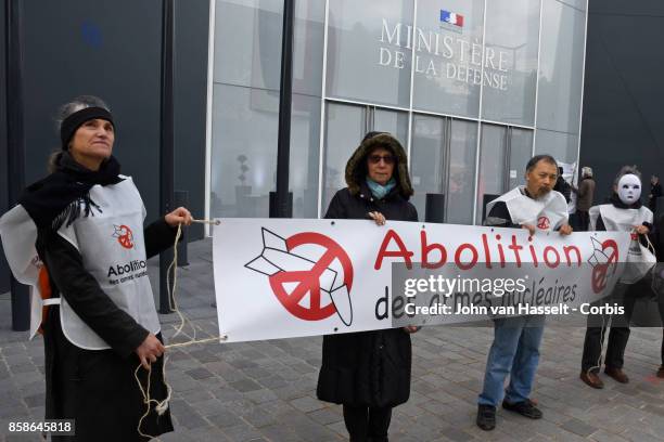 On the day that the International Campaign Against Nuclear Weapons were announced as winners of the Nobel Peace Prize, members of its French branch...