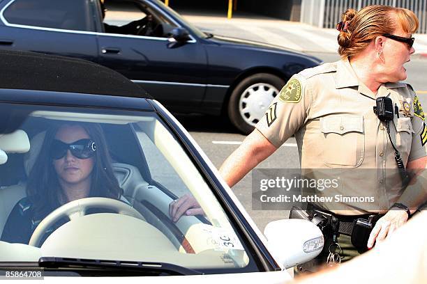 Musician Britney Spears arrives for a child custody hearing at the Los Angeles Superior Court on October 26, 2007 in Los Angeles, California.