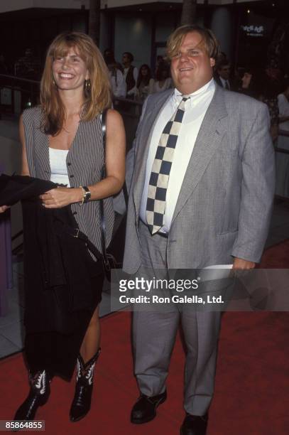 Actress Tawny Kitaen and actor Chris Farley attend the screening of "So I Married An Axe Murderer" on July 28, 1993 at the Hollywood Galaxy Theater...