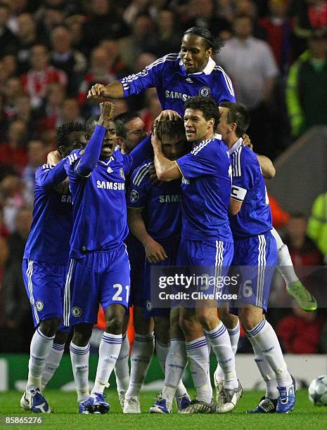 Branislav Ivanovic of Chelsea celebrates with his team mates after scoring his team's first goal during the UEFA Champions League Quarter Final First...