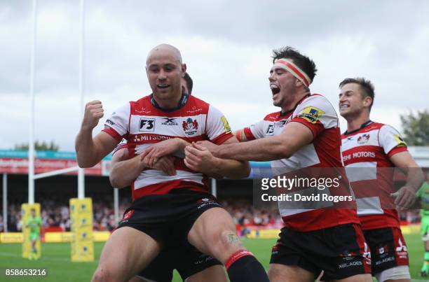 Willi Heinz of Gloucester celebrates after scoring their fifth try during the Aviva Premiership match between Gloucester Rugby and Northampton Saints...