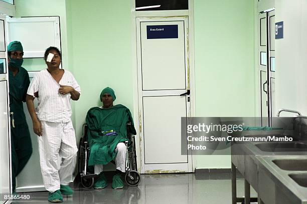 Patient is led out opf an operation room after cataract surgery at Cuba's and Venezuela's joint program 'Operacion Milagro,' Operation Miracle, at...