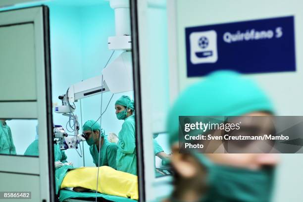 Surgeon performs cataract surgery on a patient at Cuba's and Venezuela's joint program 'Operacion Milagro,' Operation Miracle, at the Ramon Pando...