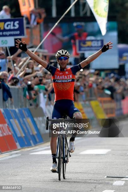 Italy's Vincenzo Nibali from the Bahrain-Merida team gestures as he celebrates victory while crossing the finish line of the 111th edition of The...