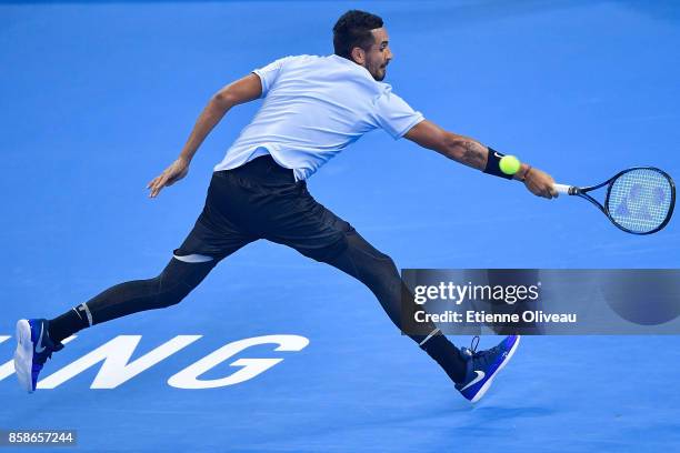 Nick Kyrgios of Australia returns a shot during his Men's singles semifinal match against Alexander Zverev of Germany on day eight of 2017 China Open...