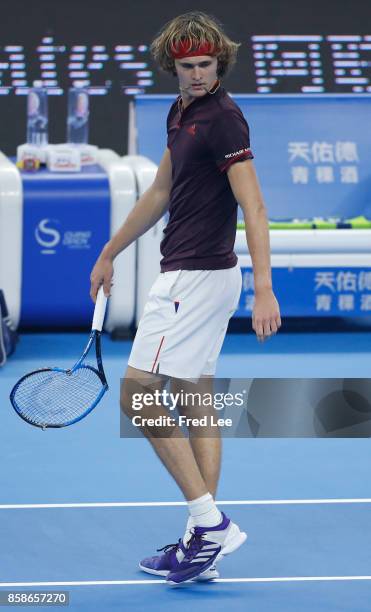 Alexander Zverev of Germany throws his racquet during his Men's singles semifinal match against Nick Kyrgios of Australia on day eight of 2017 China...