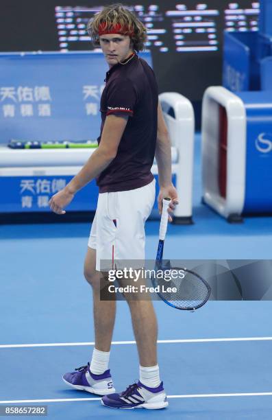 Alexander Zverev of Germany throws his racquet during his Men's singles semifinal match against Nick Kyrgios of Australia on day eight of 2017 China...