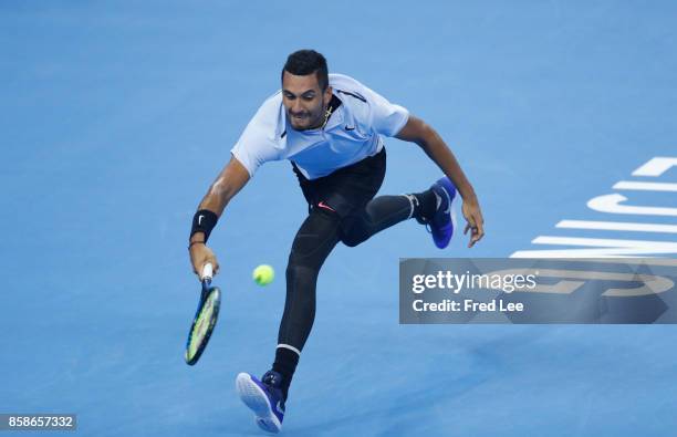 Nick Kyrgios of Australia returns a shot against Alexander Zverev of Germany during the Men's singles Semifinals on day eight of 2017 China Open at...