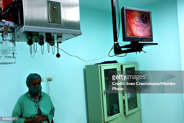 Nurse monitors a cataract surgery at Cuba's and Venezuela's joint program 'Operacion Milagro,' Operation Miracle, at the Ramon Pando Ferrer Eye...