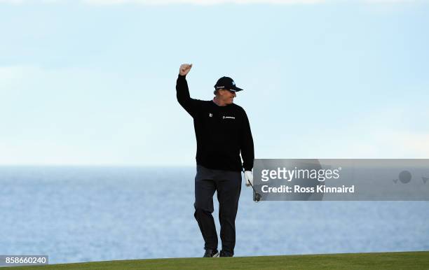 Ernie Els of South Africa celebrates the shot of Rurik Gobel, Businessman on the 9th hole during day three of the 2017 Alfred Dunhill Championship at...
