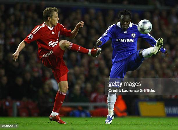 Michael Essien of Chelsea competes for the ball with Lucas of Liverpool during the UEFA Champions League Quarter Final First Leg match between...