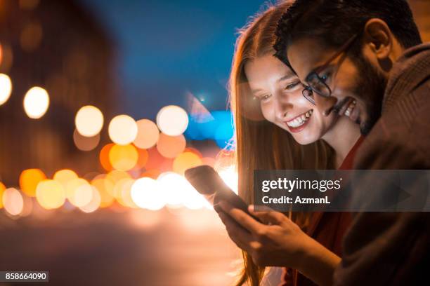 you are my shining star - couple smartphone happy stock pictures, royalty-free photos & images