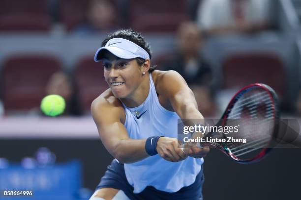 Caroline Garcia of France returns a shot during the Women's Singles Semifinals match against Petra Kvitova of the Czech Republic on day eight of 2017...