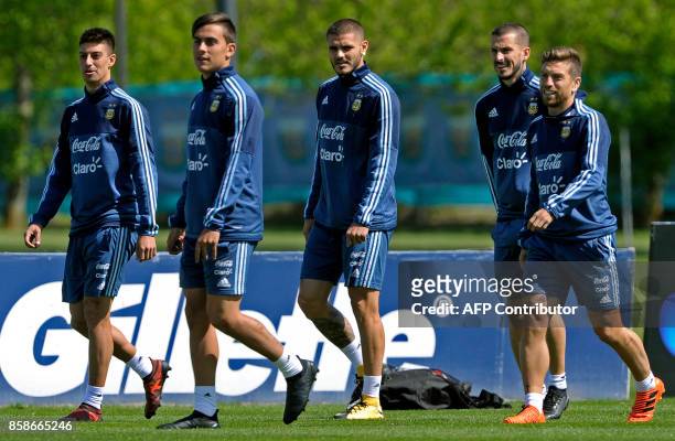 Argentina's midfielder Emiliano Rigoni, forwards Paulo Dybala, Mauro Icardi, Dario Benedetto and midfielder Alejandro Gomez take part in a training...