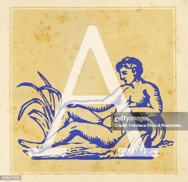 Capital letter A with Aquarius zodiac sign . Digital illustration realized by assembling 19th - century printing elements by Elena Piccini, Italy,...