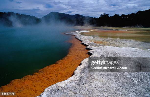 champagne pool at wai-o-tapu thermal wonderland. - waiotapu thermal park stock pictures, royalty-free photos & images