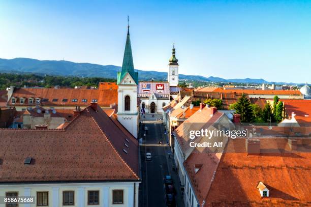 church of st. mark timelapse and parliament building zagreb, croatia. top view from kula lotrscak tower - zagreb street stock pictures, royalty-free photos & images