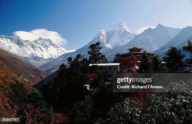 tengboche monastery in front of mt everest, lhotse, nuptse & ama dablam. - thyangboche monastery stock pictures, royalty-free photos & images