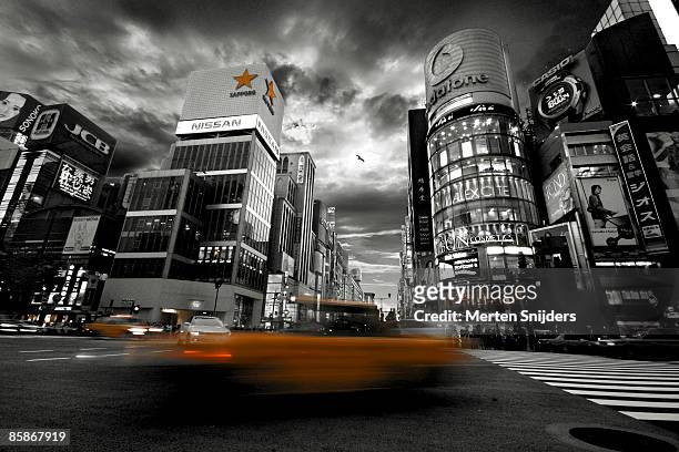 street scene in ginza. - ginza crossing stock pictures, royalty-free photos & images