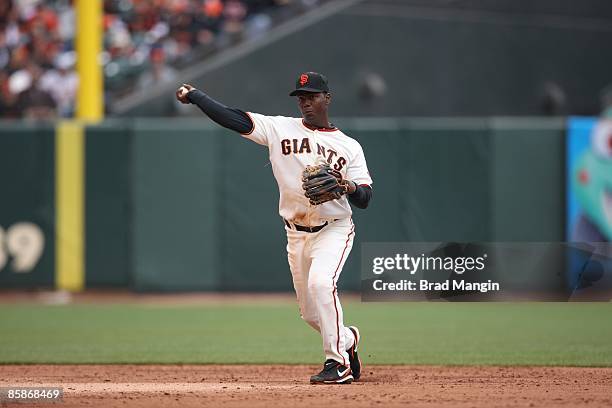 Edgar Renteria of the San Francisco Giants makes a play at shortstop during the game against the Milwaukee Brewers at AT&T Park in San Francisco,...